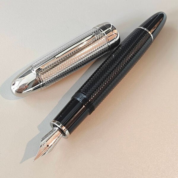 H0c27f28b9afb43d4958a6d4fcba888d94.jpg_960x960q80.jpg JD 149 Carved-Design Writing Pen – Classic Metal Finish