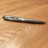 H399b8452ca17497fb23a5d507bd18441O.webp Copper-Tone Metal Rollerball Pen – Weighted Design