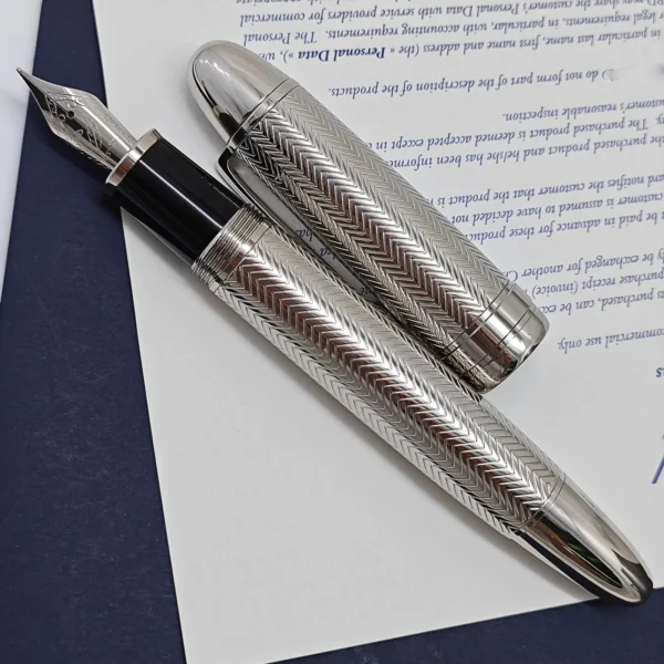 H462d3d08af67431398512b35901208d9m.webp JD 149 Carved-Design Writing Pen – Classic Metal Finish