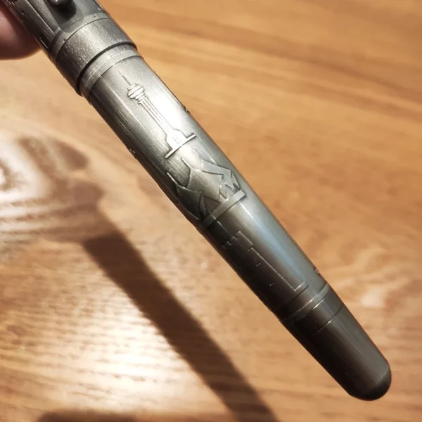 H52a7984cfc6640baa77e4d5520ac1a84F.webp Copper-Tone Metal Rollerball Pen – Weighted Design