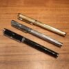 H828dc98ea2ff4711bd697fafe97f6a20E.jpg_960x960q80.jpg Gold & Silver-Tone Fountain Pen – Elegant Writing Design